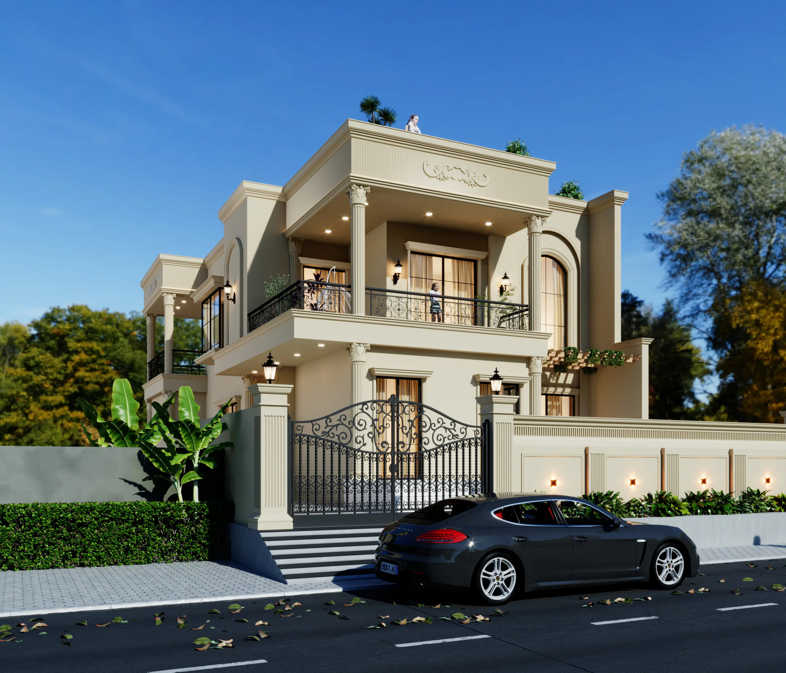 Jatin Residence corner view with a columned verandah, arched window and panelled boundary wall